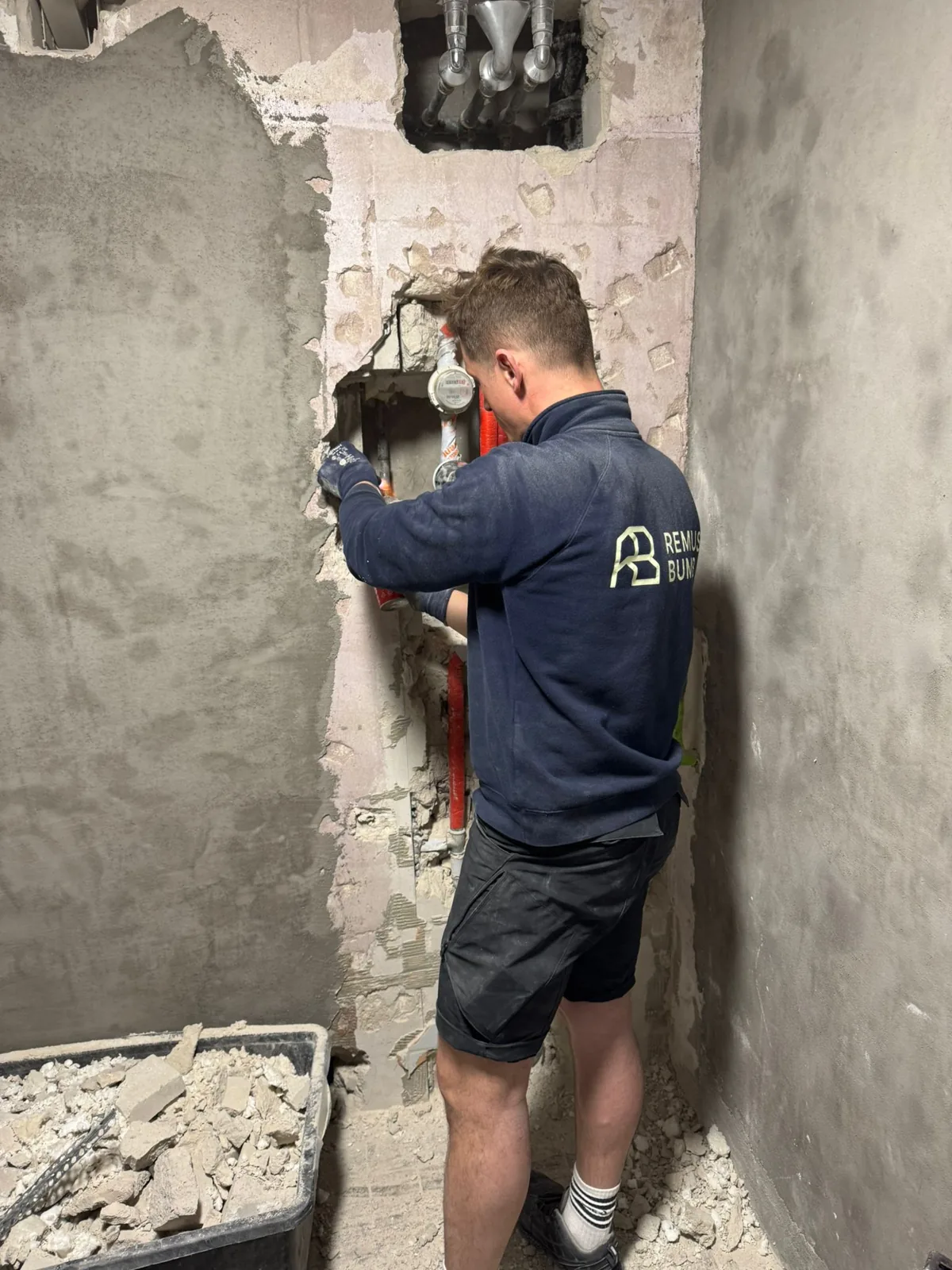 Remus Bumb at work, wearing branded Remus Bumb workwear