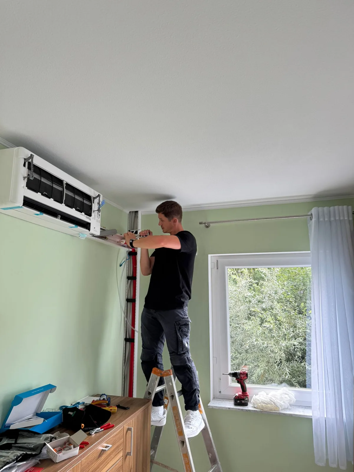 Remus Bumb working at height during a building project