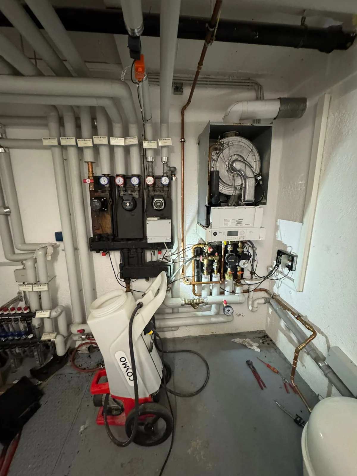 Open heating system with copper pipework, pumps and manifolds